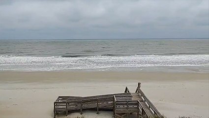 Gray skies hang over the beach