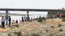 Dead bodies buried in sand near Ganga, dogs feeding on them