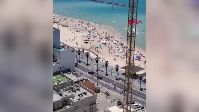 İsrail'de plajdaki halk sığınaklara koştu