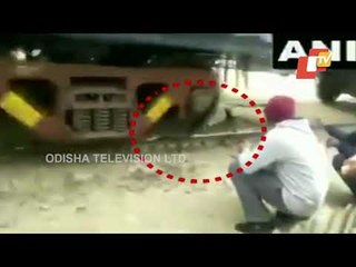 Rohtak Woman Saves Her By Lying Under Moving Train