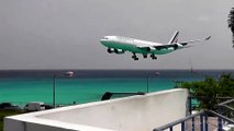 Plane Flies Extremely Low Over Busy Beach