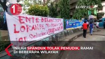 TOP3NEWS: Spanduk Untuk Pemudik, Erick Thohir Murka, 2 Teroris KKB Ditembak