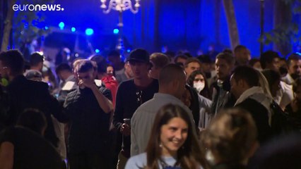 Police break up crowds in Barcelona after state of emergency lifted