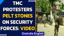 TMC supporters protest outside Governor's residence, pelt stones| Oneindia News