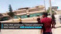 Terör örgütü YPG/PKK yandaşları Suriye’de ABD ordusuna ait araçları taşladı