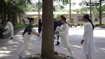 American master teaches martial arts skills at Kung Fu Academy in Wudang