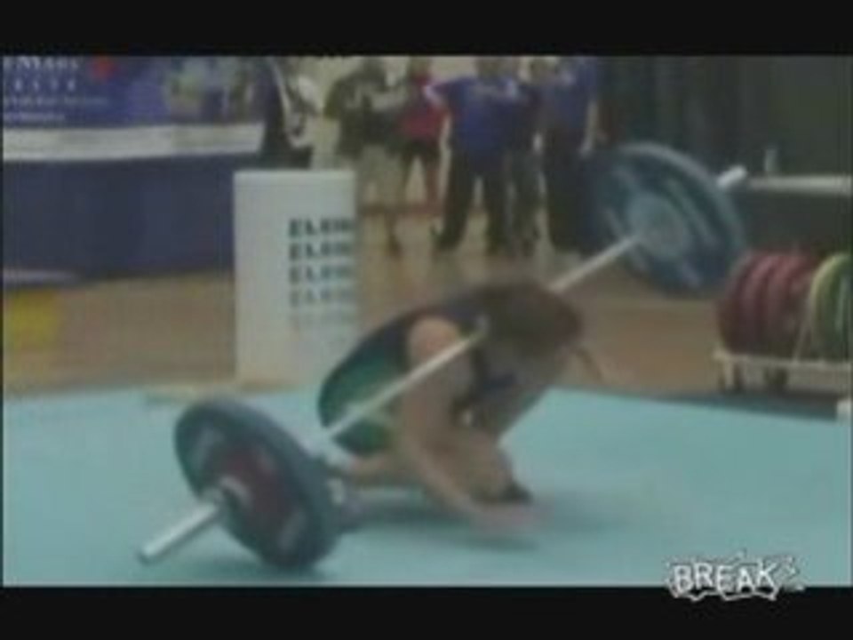 Female Weightlifter Drops Bar on Her Head