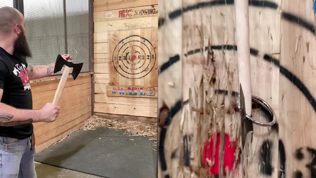 'Ax thrower flawlessly catches a flying 3-inch ring with a double-bit ax '