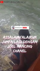Mancing dipinggir pantai