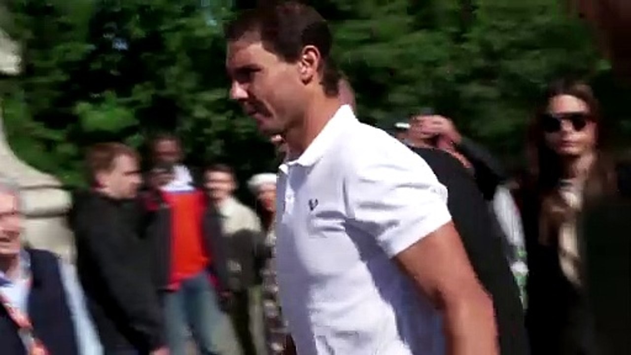 Nadal shows off his 14th French Open trophy