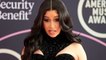 Cardi B Claps Back At Fan Accusing Her Of Boosting Streaming Numbers On Her Album | Billboard News