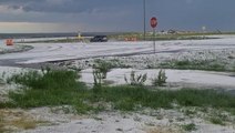 Piles of hail and powerful winds pummel the Plains