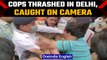 Delhi: Traffic police cop thrashed by locals in Sangam Vihar, Watch | Oneindia News *News