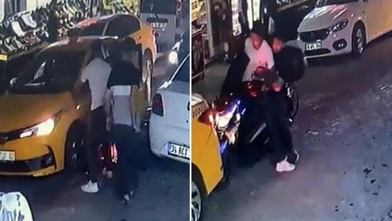 Zeytinburnu'nda taksici, aracına çarpan motosikletliyi ezmeye kalktı: O anlar kamerada