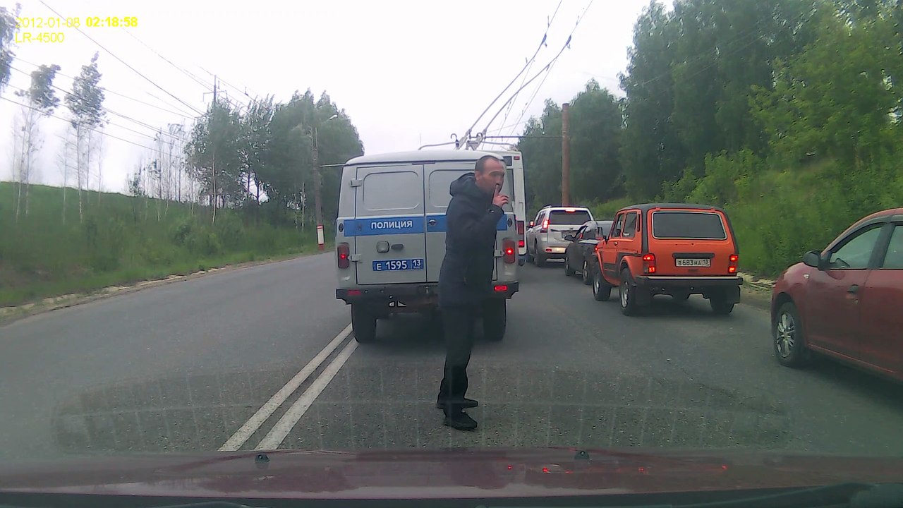Person Quietly Exists Police Van