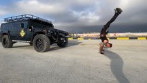 Guy Chains Jeep With His Torso and Pulls it While Performing Handstand