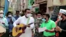 AAP MLA spreading awareness for vaccination with guitar
