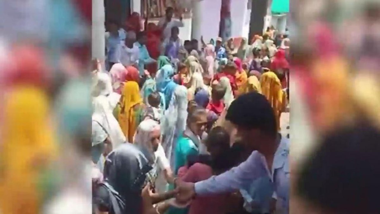 COVID cure from holy water! hundreds gather at temple