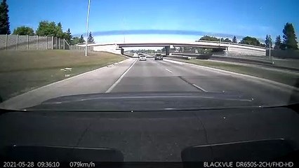 Distracted Driver Almost Accidentally Performs Pit Maneuver