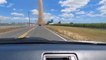 Person in Car Witnesses Dust Devil Originating From Field