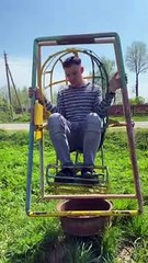Grown Man Flips in Kid's Swing