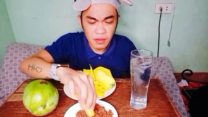 EATING JUMBO MANGOES