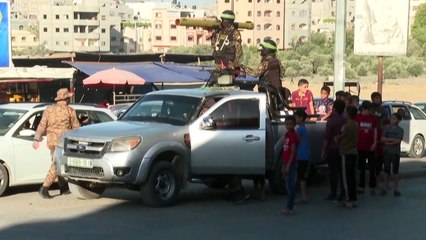 Members of Hamas' armed wing parade in Gaza City