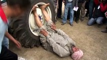 Muscle power of desi pehalwan - lifting a tractor with feet!