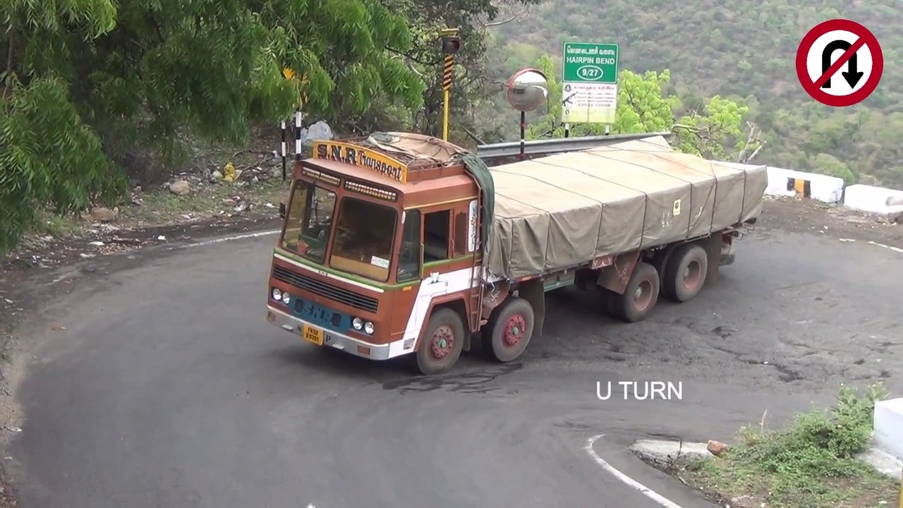 Flat Bed Truck With full Load Struggling On Dangerous Hairpin Bend At Dhimbam Uturn