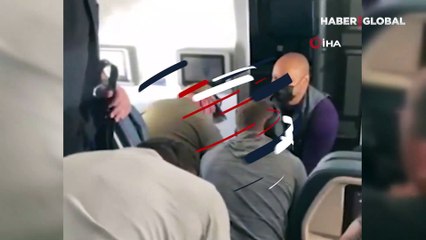 Uçakta panik! Zorla kokpite girmeye çalıştı