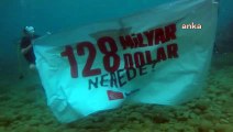 Denizin altında sordular: “128 Milyar Dolar Nerede?”