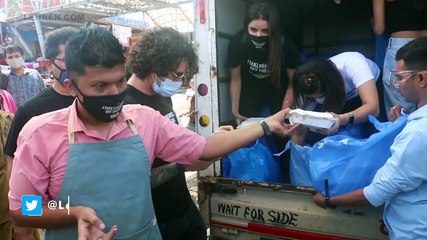 Sunny Leone And Husband Daniel Weber Distribute Food To The Poor