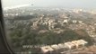 Plane landing in Mumbai - aerial footage of Bombay slums