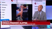 Two arrested after French President Macron was slapped in the face