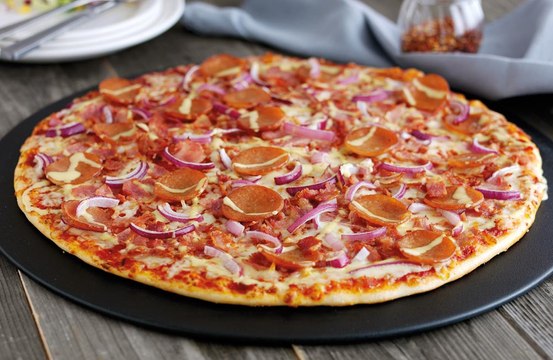 A pizza restaurant has introduced a robot to serve customers