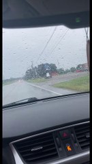 Employees Mop Up Parking Lot