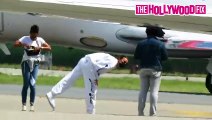 Kanye West and Irina Shayk's Security Catches Paparazzi On The Tarmac As They Land In New York City