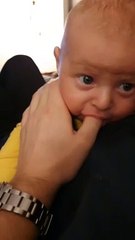 Hungry baby , when mother is busy , father finds solutions to calm the baby