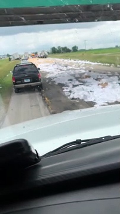 Truck Collision Scatters Debris Along Highway