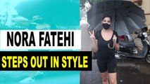 Nora Fatehi stuns in black as she steps out in Mumbai rain