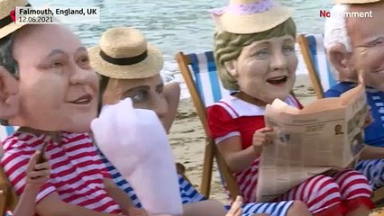 شاهد: أقنعة ضخمة لقادة مجموعة السبع في مظاهرة لنشطاء بيئيين في بريطانيا