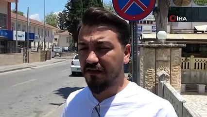 Dalgın sürücü para dolu cüzdanını aracının üzerinde unutarak yoluna devam etti