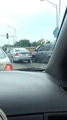 Minivan Slams Into Stationary Sedan Before Speeding Away