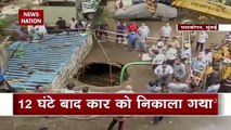 Car being completely swallowed by a sinkhole in Mumbai's Ghatkopar