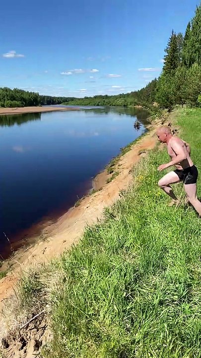 Man Barely Makes Leap into Dirty Pond