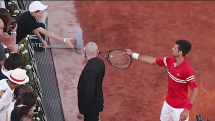 Image of the day: Novak Djokovic gifts French Open winning racquet to young fan