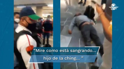 Por no usar cubrebocas, policía noquea a usuario del Metro