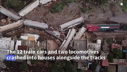 One dead as freight train topples onto Mexican homes
