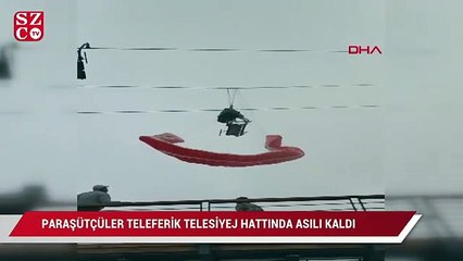 Tải video: Paraşütçüler teleferik telesiyej hattında asılı kaldılar