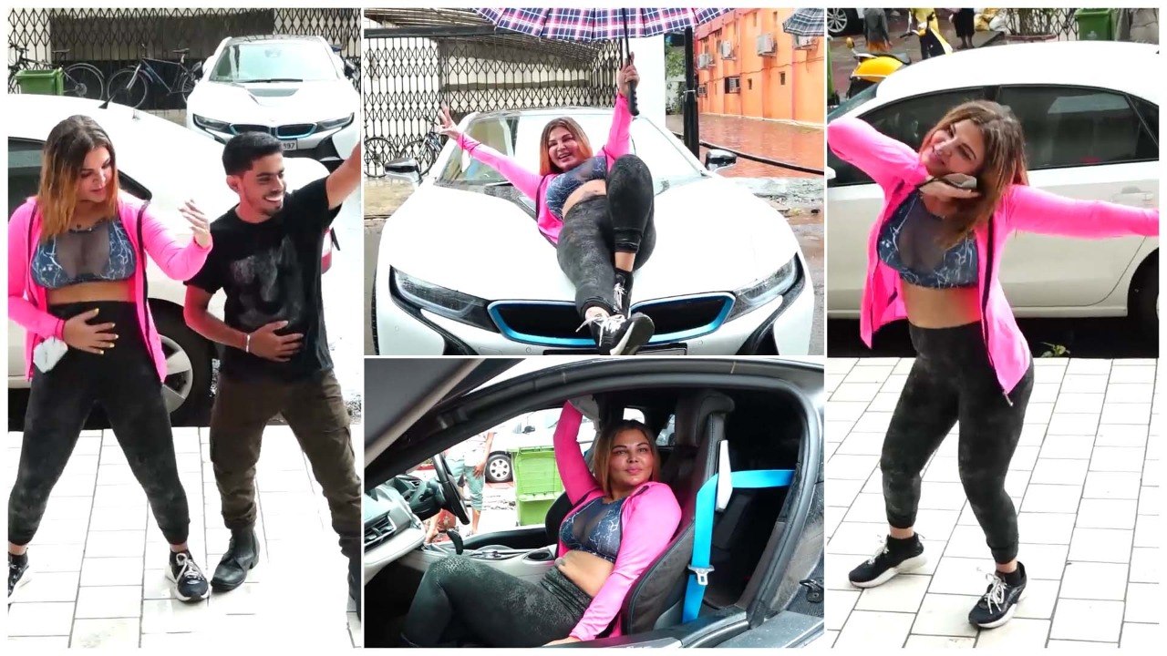 Rakhi Sawant Enjoys Mumbai Rains While Striking Poses On A Car